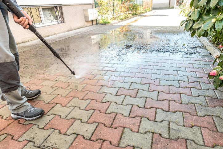 Patio slabs cleaned to remove algae and dirt